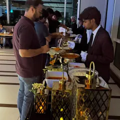Our buffet and bar setup for a L'Oréal corporate dinner. We can manage multiple service points, ensuring smooth guest flow even at large and high-profile events.