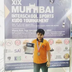 Hard work pays off. This is Arnav, one of our students, after winning second place at the Mumbai Interschool Kudo Tournament. We don't just train in the gym; we prepare them to test their skills and prove their grit.