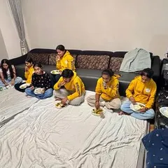 A fun evening hosted by friends of the academy. Our team enjoying a meal together, sitting on the floor in a true family style.