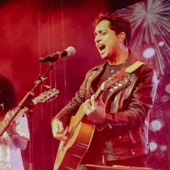 Nikhil D'Souza delivering a powerful vocal performance during his live show in Pune. His indie and Bollywood fusion is a massive hit with college crowds.