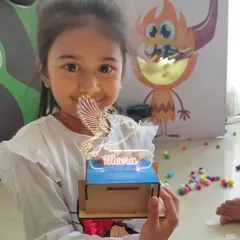 A close-up of a personalized light-up lamp, made by the birthday girl herself. Each child gets to customize their project, making it truly their own.