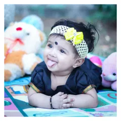 A cheeky and fun shot from the same outdoor baby session. It's these little, spontaneous moments that often make the best memories.
