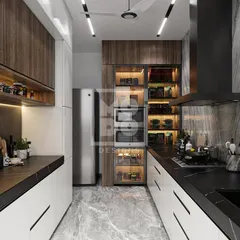 A look inside a highly functional galley kitchen. We maximized storage with floor-to-ceiling cabinets and ensured a seamless workflow with integrated appliances and well-lit countertops.