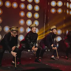 The bride's brothers brought the fun with this quirky, themed performance. Using police hats and canes as props, they created a memorable and entertaining act.