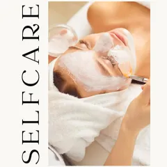 A moment of pure self-care. A custom face mask is being applied to deeply cleanse and nourish the skin, a key step in all our signature facial treatments.