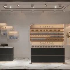 A look inside the perfume boutique concept. I designed custom, curved display cabinets with integrated lighting to showcase the products beautifully. The layout is open and inviting, encouraging customers to explore.