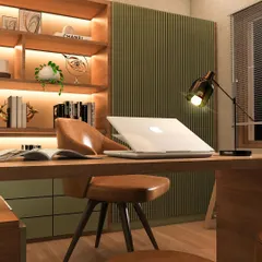 A closer look at the details of a luxury office revamp. The combination of a rich leather chair, a sleek desk lamp, and a textured green accent wall creates a sophisticated and comfortable workspace designed for focus and inspiration.