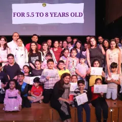The cast and proud families of our 5.5 to 8 year old group after a successful performance. The joy and confidence are palpable.