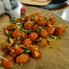 Crispy on the outside and soft on the inside, our Honey Sesame Potatoes are a crowd-favourite appetizer. These bite-sized potatoes are tossed in a sweet and sticky sauce with a hint of spice.