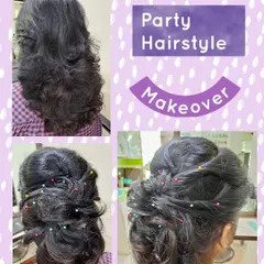 A fun and festive party hairstyle. This messy, textured updo is decorated with colorful pins, making it a perfect choice for a lively celebration.