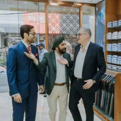 An engaging discussion with Mr. Gregor Thissen, Executive Chairman of Scabal, at our atelier. These interactions reinforce our commitment to sourcing only the finest materials for our discerning clientele.