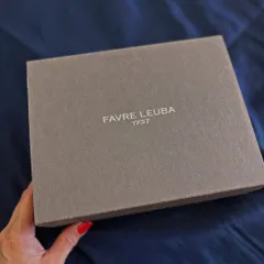 The starting point for a luxury groom's gift. The clean, elegant box from Favre Leuba sets the tone for the sophisticated and thoughtful packaging that will be built around it.