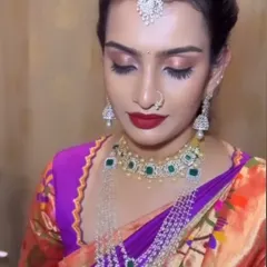 Another view of the eye makeup. The blend of warm and neutral tones creates a look that is glamorous without being overpowering.
