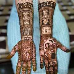 This sweet baby shower design includes portraits of the expecting parents, cute baby clothes motifs, and a "Coming Soon" message to announce the happy news.
