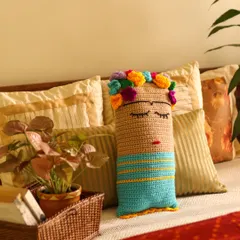 Inspired by one of my favorite artists, this Frida Kahlo crochet cushion is designed to add a bold and creative touch to any cozy corner. It features her iconic floral crown and a peaceful expression, perfect for a reading nook or bedroom.