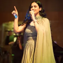On stage is where I feel most at home. This shot captures a moment of pure connection with the music and the audience. Whether it's a grand concert or an elegant private event, I pour my heart into every note.