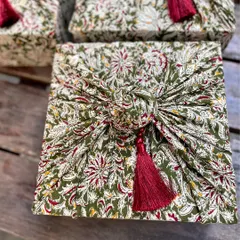 My approach to gifting is rooted in tradition and crafted with intention. This Furoshiki-style fabric wrapping, using beautiful Kalamkari cloth and a fine tassel, transforms a simple box into a piece of art. It’s a sustainable and elegant choice that honors heritage while feeling completely timeless.