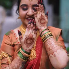 A lovely stained engagement mehendi with lotus mandalas on the palms. The design is simple, elegant, and the rich stain makes it stand out beautifully.