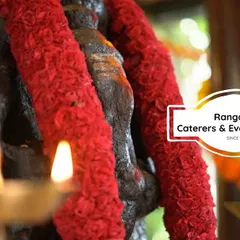We begin our most important events with a prayer. This image of a deity adorned with flowers reflects our deep connection to the cultural and spiritual aspects of the food we serve.