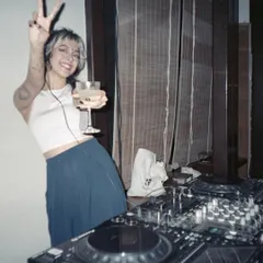 Cheers to good times. A candid shot from a private party, raising a glass to a great night of music and celebration.