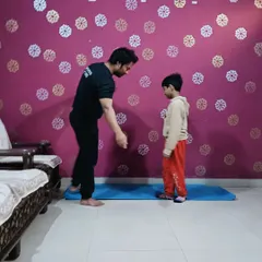 Teaching the importance of posture and alignment, which is the foundation of both yoga and strength training.