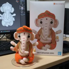 This Amigurumi Ganesha is one of my most requested spiritual figures. Here you can see the final handmade doll next to its original design, showing how I transform a concept into a detailed, three-dimensional piece.