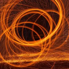An abstract spiral of light created with steel wool and the Samsung Galaxy Z Flip 5. This image focuses on the pure artistry of light painting, producing a mesmerizing and highly shareable visual.