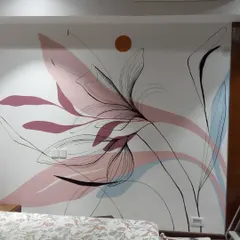 This boho mural with pastel shades is in a bedroom. The combination of abstract color shapes and fine line art creates a dreamy and artistic atmosphere.