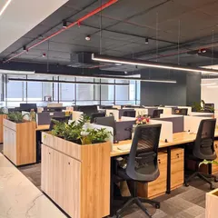 The open and collaborative workspace in our new Bengaluru office, featuring modern infrastructure and amenities to foster teamwork and efficiency.