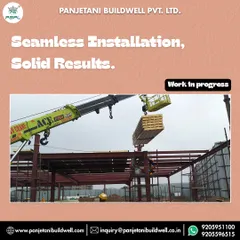 A crane lifting a bundle of our PUF roof panels into place at the Experion site. This highlights our process of seamless installation, which leads to solid, reliable results for our clients.