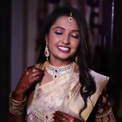 A candid, happy moment. The makeup is set to last all night, through dancing and celebrating, while still looking fresh.