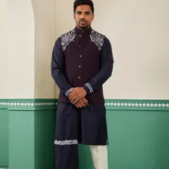 Our space blue bundi set, viewed from the front. The deep, rich colors are complemented by the striking silver embroidery on the shoulders, creating a look of understated luxury.