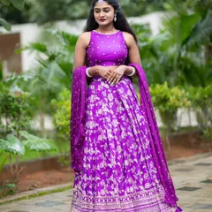 The complete look. This custom-stitched purple Banarasi lehenga with a matching dupatta is perfect for any festive occasion.