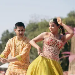 For Mishi's mehndi, it was all about fun and movement. Her makeup, featuring a pop of color on the eyes, was designed to be vibrant and stay put while she danced and celebrated with her family and friends.