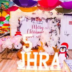 I can create magical holiday-themed parties, like this winter wonderland celebration for a 5th birthday. The decor included a "Merry Christmas" backdrop, a snowman balloon figure, and a friendly penguin cutout to complete the festive scene.