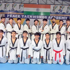Our male athletes standing together for a team photo. This group represents a brotherhood of fighters who push each other to be their best every single day.