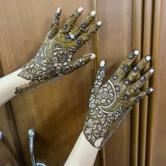 Another view of the unique crescent design, showing how it elegantly covers the back of the hand.