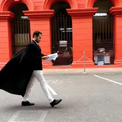 In motion outside the High Court of Karnataka. I am committed to actively pursuing my clients' cases and keeping the legal process moving forward.
