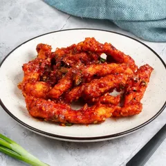 Another look at our irresistible Honey Chilli Crispy Chicken, with its glossy sauce and crispy texture.
