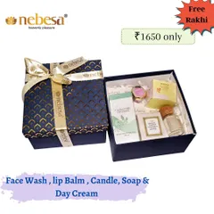 For a more luxurious Rakhi gift, I offer this hamper. It contains a face wash, lip balm, a candle, a soap, and a day cream, all presented in an elegant, reusable gift box.