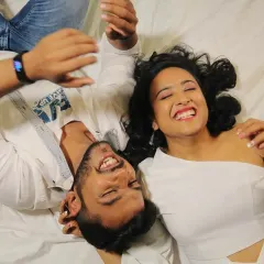 The same joyful moment from a different perspective, showing the genuine happiness of the couple.