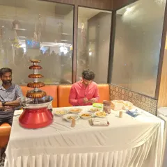 A chocolate fountain station we arranged for a birthday party. It comes with a variety of dips like fruits, marshmallows, and wafers, and is a delicious treat for all guests.