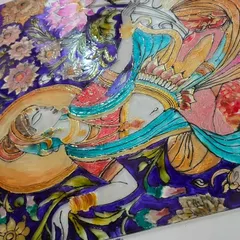 Discover the delicate art of glass painting, a unique craft that transforms a simple piece of glass into a stunning work of art. This intricate piece showcases the beautiful results of combining traditional design with modern color techniques.