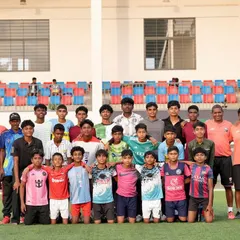 A group picture with all the players and coaches on the last day of scouting. A successful end to an intense few days of talent-spotting.