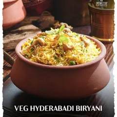 Our Veg Hyderabadi Biryani, cooked in a traditional clay pot to lock in the aromatic spices and flavours. A royal dish for a royal celebration.