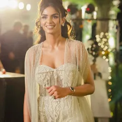 For the mehendi, we wanted a look that was fuss-free, elegant, and unique. This Shantanu and Nikhil gown with a delicate cape was the perfect choice, allowing her to be comfortable while still looking incredibly chic.
