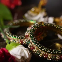 A macro shot of the intricate design on the bridal bangles. We love capturing these small but significant details that the bride has carefully chosen for her special day.