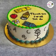 A fun and creative cake for Teacher's Day, decorated with cute, hand-drawn school supplies and a "Thank You" message.