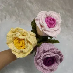 Another view of the three handmade dual-color roses, showing how they look together in a bouquet.