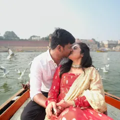 A kiss that felt like a confession of forever. This romantic pre-wedding portrait on the Ganga in Banaras captures a love as timeless as the city itself.